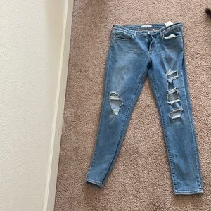 Levi’s ripped 711 skinny jeans